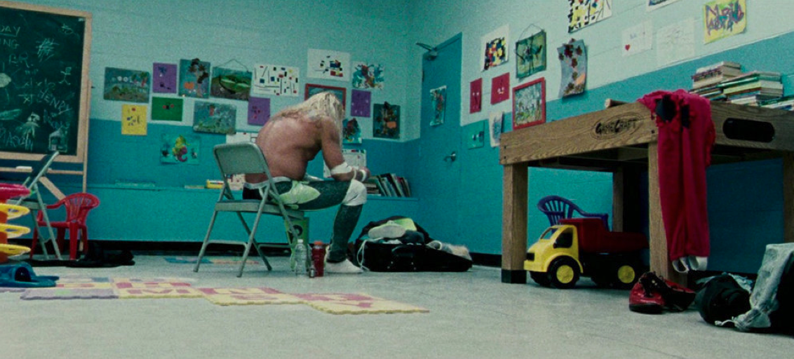 Composition arranging figures within the frame to imply power