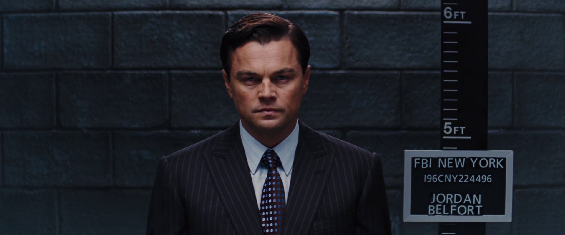 Jordan Belfort addressing the audience in The Wolf of Wall Street